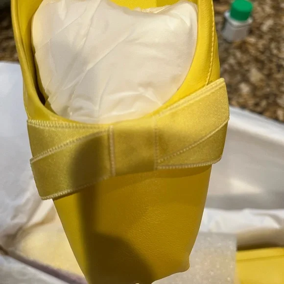 Christian Louboutin Yellow Flats Modern Minimalist Design